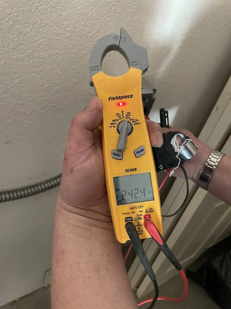 Voltage testing with clamp meter during Ceiling Fan Installation in Sylacauga